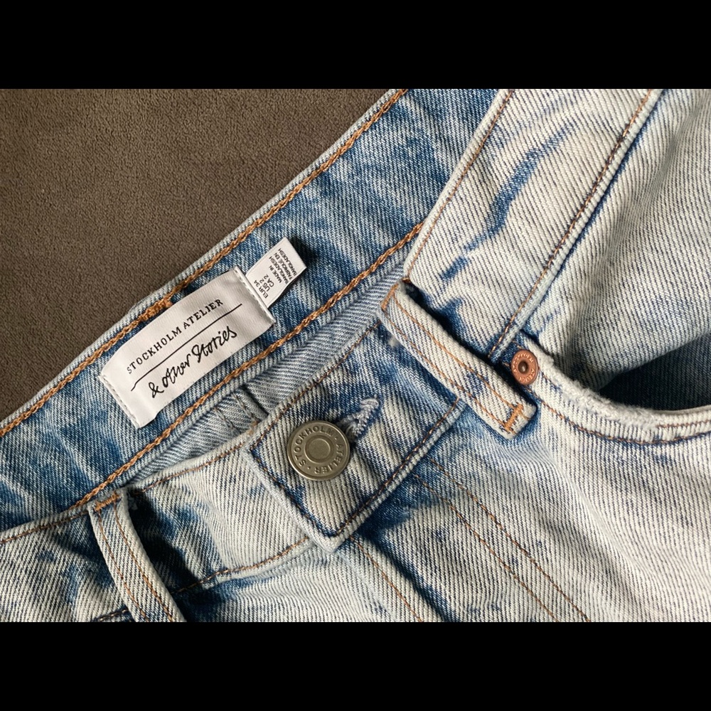 Mini light blue denim skirt